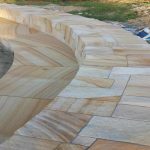 img-Sandstone Firepit And Curved Seat